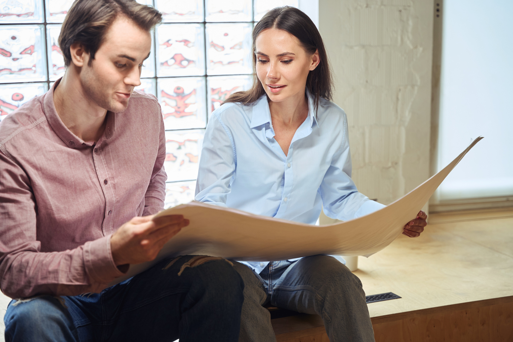 Architectural team involved in analyzing floor plans